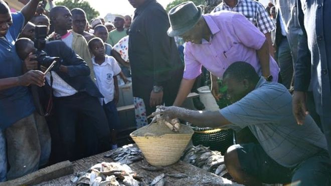 President Magufuli shopping with a basket